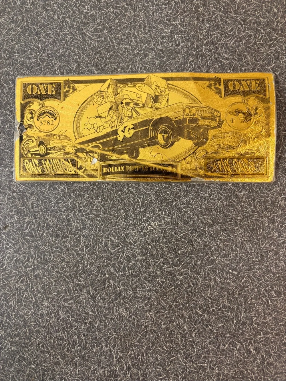 Sprayground Gold Trillion Novelty Wall Plaque